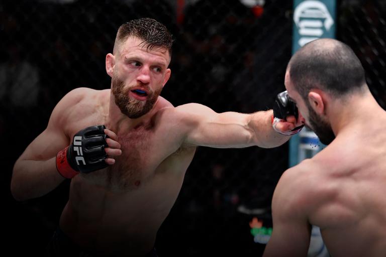 LAS VEGAS, NEVADA - JANUARY 15: (L-R) Calvin Kattar punches Giga Chikadze of Georgia in their featherweight fight during the UFC Fight Night event at UFC APEX on January 15, 2022 in Las Vegas, Nevada. (Photo by Jeff Bottari/Zuffa LLC)