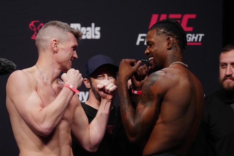 Opponents Stephen Thompson and Kevin Holland face off during the UFC Fight Night ceremonial weigh-in at Amway Center on December 02, 2022 in Orlando, Florida. (Photo by Jeff Bottari/Zuffa LLC)