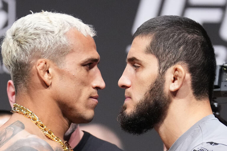 Opponents Charles Oliveira of Brazil and Islam Makhachev of Russia face off during the UFC 280 ceremonial weigh-in at Etihad Arena on October 21, 2022 in Abu Dhabi, United Arab Emirates. (Photo by Chris Unger/Zuffa LLC)