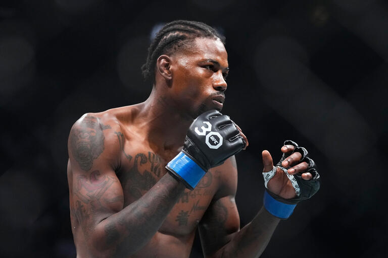 Kevin Holland battles Michael Chiesa in a welterweight fight during the UFC 291 event at Delta Center on July 29, 2023 in Salt Lake City, Utah. (Photo by Jeff Bottari/Zuffa LLC)