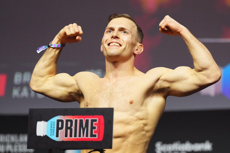  Brad Katona of Canada poses on the scale during the UFC 297 ceremonial weigh-in at Scotiabank Arena on January 19, 2024 in Toronto, Ontario. (Photo by Jeff Bottari/Zuffa LLC)