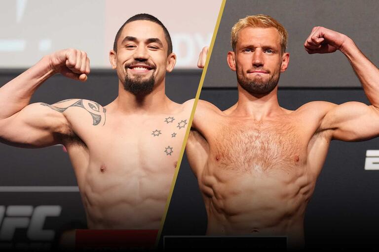Robert Whittaker and Reinier de Ridder step on the scale