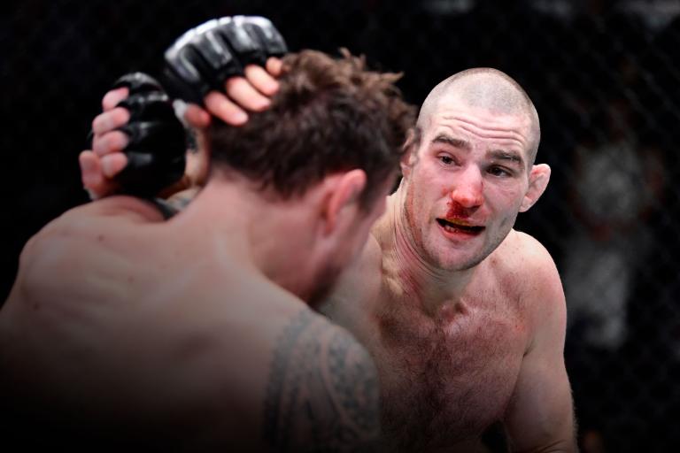 Sean Strickland punches Jack Hermansson of Sweden in their middleweight fight during the UFC Fight Night event at UFC APEX on February 05, 2022 in Las Vegas, Nevada. (Photo by Chris Unger/Zuffa LLC)