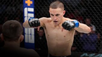 COLUMBUS, OHIO - MARCH 26: (R-L) Kai Kara-France of New Zealand points to the center of the Octagon during his flyweight fight against Askar Askarov of Russia during the UFC Fight Night event at Nationwide Arena on March 26, 2022 in Columbus, Ohio. (Photo by Josh Hedges/Zuffa LLC)