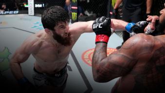 LAS VEGAS, NEVADA - MARCH 12: (L-R) Magomed Ankalaev of Russia punches Thiago Santos of Brazil in their light heavyweight fight during the UFC Fight Night event at UFC APEX on March 12, 2022 in Las Vegas, Nevada. (Photo by Chris Unger/Zuffa LLC)