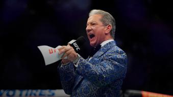 UFC Octagon Announcer Bruce Buffer signals the start of Shane Burgos and Edson Barboza of Brazil in their featherweight bout during the UFC 262 event at Toyota Center on May 15, 2021 in Houston, Texas. (Photo by Cooper Neill/Zuffa LLC)