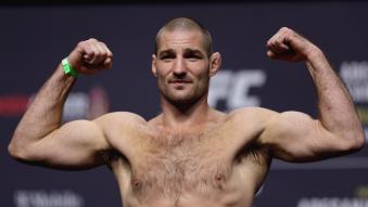 Sean Strickland poses on the scale during the UFC 276 ceremonial weigh-in at T-Mobile Arena on July 01, 2022 in Las Vegas, Nevada. (Photo by Carmen Mandato/Getty Images)