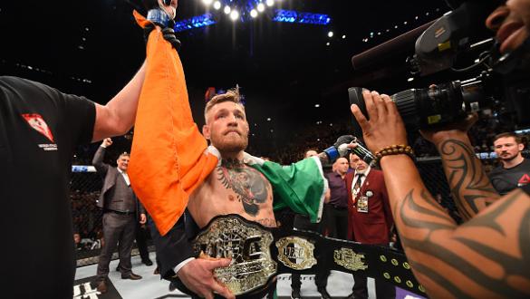 LAS VEGAS, NV - DECEMBER 12:  Conor McGregor of Ireland reacts to his victory over Jose Aldo of Brazil in their UFC featherweight championship bout during the UFC 194 event inside MGM Grand Garden Arena on December 12, 2015 in Las Vegas, Nevada.  (Photo b