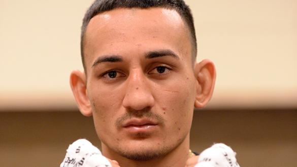 NEWARK, NJ - APRIL 18:  Max Holloway has his hands wrapped prior to his fight against Cub Swanson during the UFC Fight Night event at Prudential Center on April 18, 2015 in Newark, New Jersey.  (Photo by Mike Roach/Zuffa LLC/Zuffa LLC via Getty Images)