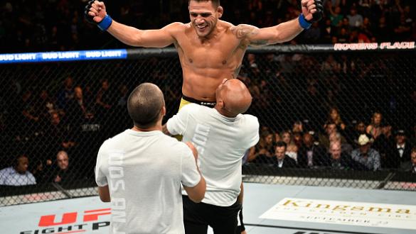 EDMONTON, AB - SEPTEMBER 09:  Rafael Dos Anjos of Brazil celebrates his submission victory over Neil Magny in their welterweight bout during the UFC 215 event inside the Rogers Place on September 9, 2017 in Edmonton, Alberta, Canada. (Photo by Jeff Bottar