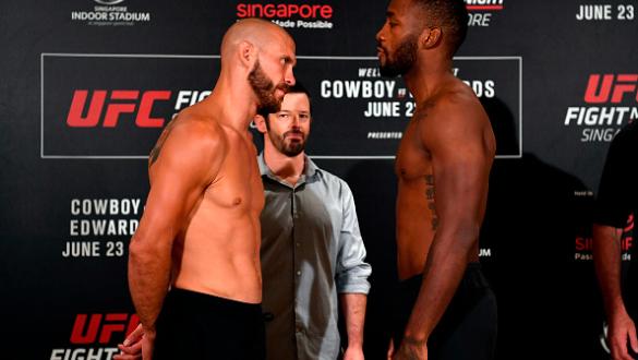 SINGAPORE - JUNE 22:  (L-R) Opponents Donald Cerrone of the United States and Leon Edwards of Jamaica face off during the UFC Fight Night weigh-in at the Mandarin Oriental on June 22, 2018 in Singapore. (Photo by Jeff Bottari/Zuffa LLC/Zuffa LLC via Getty