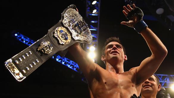 BOSTON, MA - JANUARY 17:  Dominick Cruz celebrates defeating T.J. Dillashaw (not pictured) to win the World Bantamweight Championship during UFC Fight Night 81 at TD Banknorth Garden on January 17, 2016 in Boston, Massachusetts.  (Photo by Maddie Meyer/Ge