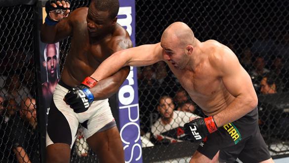NASHVILLE, TN - AUGUST 08:  (R-L) Glover Teixeira of Brazil punches Ovince Saint Preux in their light heavyweight bout during the UFC Fight Night event at Bridgestone Arena on August 8, 2015 in Nashville, Tennessee.  (Photo by Josh Hedges/Zuffa LLC/Zuffa 