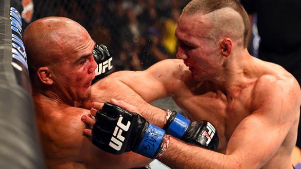 LAS VEGAS, NV - JULY 11:  (R-L) Rory MacDonald elbows Robbie Lawler in their UFC welterweight title fight during the UFC 189 event inside MGM Grand Garden Arena on July 11, 2015 in Las Vegas, Nevada.  (Photo by Josh Hedges/Zuffa LLC/Zuffa LLC via Getty Im