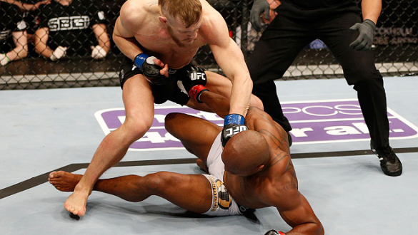 STOCKHOLM, SWEDEN - APRIL 06:  (L-R) Conor McGregor punches Marcus Brimage in their featherweight fight at the Ericsson Globe Arena on April 6, 2013 in Stockholm, Sweden.  (Photo by Josh Hedges/Zuffa LLC/Zuffa LLC via Getty Images)
