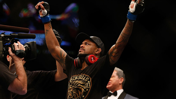 LAS VEGAS, NV - DECEMBER 28:  Michael Johnson reacts to his victory over Gleison Tibau in their lightweight bout during the UFC 168 event at the MGM Grand Garden Arena on December 28, 2013 in Las Vegas, Nevada. (Photo by Josh Hedges/Zuffa LLC/Zuffa LLC vi