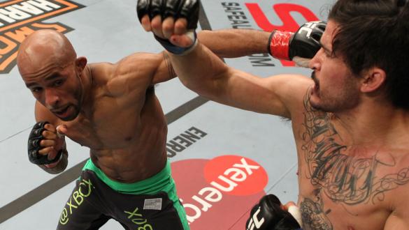 SYDNEY, AUSTRALIA - MARCH 03: (L-R) Demetrious Johnson and Ian McCall trade punches in a flyweight bout during the UFC on FX event at Allphones Arena on March 3, 2012 in Sydney, Australia. (Photo by Josh Hedges/Zuffa LLC/Zuffa LLC via Getty Images) ***