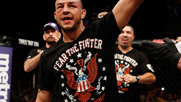 LONDON, ENGLAND - FEBRUARY 16:  Cub Swanson reacts after defeating Dustin Poirier in their featherweight fight during the UFC on Fuel TV event on February 16, 2013 at Wembley Arena in London, England.  (Photo by Josh Hedges/Zuffa LLC/Zuffa LLC via Getty I