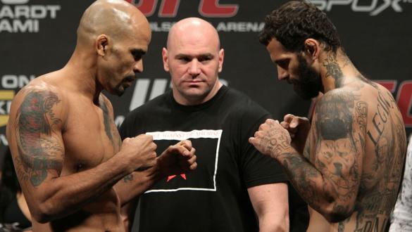 Middleweight opponents Jorge Rivera (L) of United States  and Alessio Sakara (R) of Italy face off as UFC President Dana White looks on at the UFC 122 weigh-in at the Koenig Pilsener Arena on November 12,  2010 in Oberhausen, Germany.  (Photo by Josh Hedg
