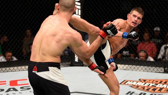 OTTAWA, ON - JUNE 18:   (R-L) Stephen Thompson of the United States kicks Rory MacDonald of Canada in their welterweight bout during the UFC Fight Night event inside the TD Place Arena on June 18, 2016 in Ottawa, Ontario, Canada. (Photo by Jeff Bottari/Zu