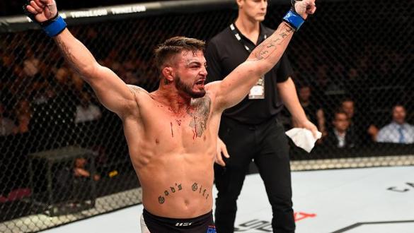 MANCHESTER, ENGLAND - OCTOBER 08:  Mike Perry celebrates his knockout victory over Danny Roberts of England in their welterweight bout during the UFC 204 Fight Night at the Manchester Evening News Arena on October 8, 2016 in Manchester, England. (Photo by