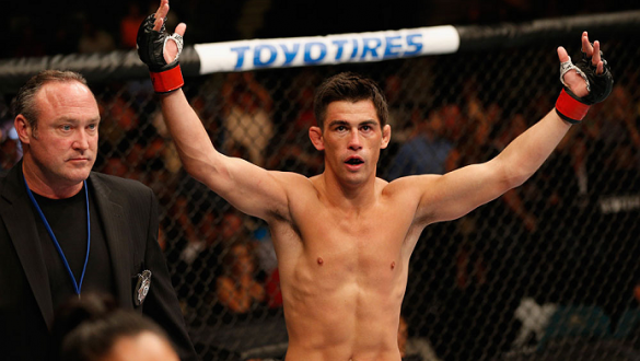 LAS VEGAS, NV - SEPTEMBER 27:  Dominick Cruz celebrates after his victory over Takeya Mizugaki in their bantamweight fight during the UFC 178 event inside the MGM Grand Garden Arena on September 27, 2014 in Las Vegas, Nevada.  (Photo by Josh Hedges/Zuffa 