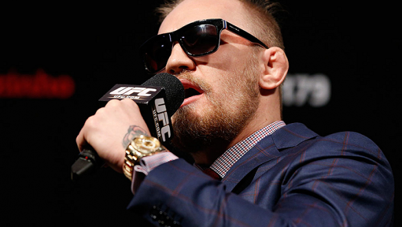 RIO DE JANEIRO, BRAZIL - OCTOBER 24:  Conor McGregor of Ireland interacts with fans during a Q&A session before the UFC 179 weigh-in at the MaracanÃ£zinho Gymnasium on October 24, 2014 in Rio de Janeiro, Brazil. (Photo by Josh Hedges/Zuffa LLC/Zuffa LLC v