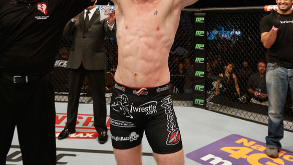 LAS VEGAS, NV - JANUARY 03:  Paul Felder celebrates his win over Danny Castillo in their lightweight bout during the UFC 182 event at the MGM Grand Garden Arena on January 3, 2015 in Las Vegas, Nevada.  (Photo by Josh Hedges/Zuffa LLC/Zuffa LLC via Getty 