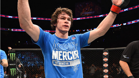 MONTREAL, QC - APRIL 25:   Olivier Aubin-Mercier of Canada reacts after his submission victory over David Michaud of the United States in their lightweight bout during the UFC 186 event at the Bell Centre on April 25, 2015 in Montreal, Quebec, Canada. (Ph