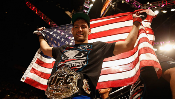 LAS VEGAS, NV - MAY 23:  Chris Weidman reacts to his victory over Vitor Belfort of Brazil in their UFC middleweight championship bout during the UFC 187 event at the MGM Grand Garden Arena on May 23, 2015 in Las Vegas, Nevada.  (Photo by Christian Peterse