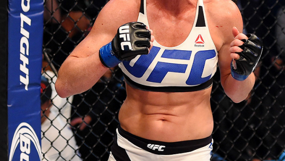MELBOURNE, AUSTRALIA - NOVEMBER 15:  Holly Holm celebrates her second round KO (headkick and punches) over Ronda Rousey (not pictured) in their UFC women's bantamweight championship bout during the UFC 193 event at Etihad Stadium on November 15, 2015 in M