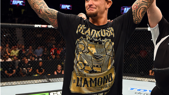 FAIRFAX, VA - APRIL 04:  Dustin Poirier celebrates after defeating Diego Ferreira by knockout in their lightweight fight during the UFC Fight Night event at the Patriot Center on April 4, 2015 in Fairfax, Virginia. (Photo by Josh Hedges/Zuffa LLC/Zuffa LL
