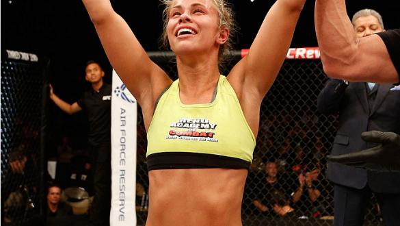 AUSTIN, TX - NOVEMBER 22:  Paige VanZant reacts after her TKO victory over Kailin Curran in their women's bantamweight bout during the UFC Fight Night event at The Frank Erwin Center on November 22, 2014 in Austin, Texas.  (Photo by Josh Hedges/Zuffa LLC/