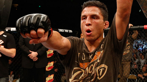 AUSTIN, TX - NOVEMBER 22:  Joseph Benavidez celebrates after his unanimous-decision victory over Dustin Ortiz in their flyweight bout during the UFC Fight Night event at The Frank Erwin Center on November 22, 2014 in Austin, Texas.  (Photo by Josh Hedges/