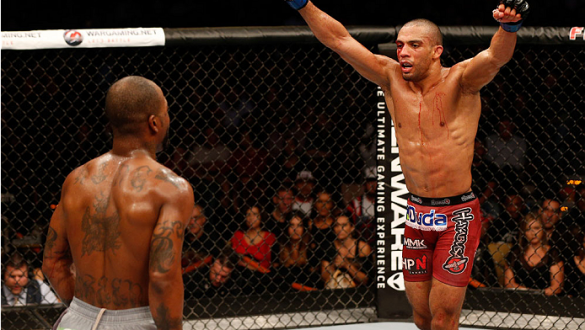 AUSTIN, TX - NOVEMBER 22:  Edson Barboza of Brazil (R) begins celebrating in the closing seconds of his lightweight bout against Bobby Green during the UFC Fight Night event at The Frank Erwin Center on November 22, 2014 in Austin, Texas.  (Photo by Josh 
