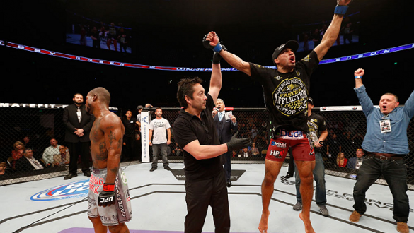 AUSTIN, TX - NOVEMBER 22:  Edson Barboza of Brazil celebrates after his unanimous-decision victory over Bobby Green in their lightweight bout during the UFC Fight Night event at The Frank Erwin Center on November 22, 2014 in Austin, Texas.  (Photo by Josh