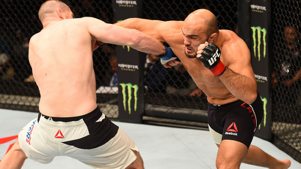 GLASGOW, SCOTLAND - JULY 18:  (R-L) Ilir Latifi of Sweden punches Hans Stringer of the Netherlands in their light heavyweight fight during the UFC Fight Night event inside the SSE Hydro on July 18, 2015 in Glasgow, Scotland.  (Photo by Josh Hedges/Zuffa L