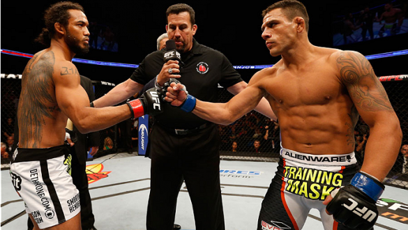 TULSA, OK - AUGUST 23:  (L-R) Opponents Benson Henderson and Rafael dos Anjos of Brazil face off before their lightweight fight during the UFC Fight Night event at the BOK Center on August 23, 2014 in Tulsa, Oklahoma. (Photo by Josh Hedges/Zuffa LLC/Zuffa