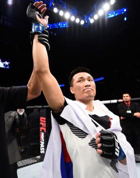 HOUSTON, TX - FEBRUARY 04: Chan Sung Jung of South Korea celebrates his victory over Dennis Bermudez in their featherweight bout during the UFC Fight Night event at the Toyota Center on February 4, 2017 in Houston, Texas. (Photo by Jeff Bottari/Zuffa LLC/Zuffa LLC via Getty Images)