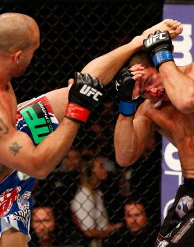SEATTLE, WA - JULY 27: (L-R) Robbie Lawler kicks Bobby Voelker in their welterweight bout during the UFC on FOX event at Key Arena on July 27, 2013 in Seattle, Washington. (Photo by Josh Hedges/Zuffa LLC/Zuffa LLC via Getty Images)
