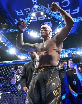 Charles Oliveira of Brazil reacts after his submission victory over Justin Gaethje in the UFC lightweight championship fight during the UFC 274 event