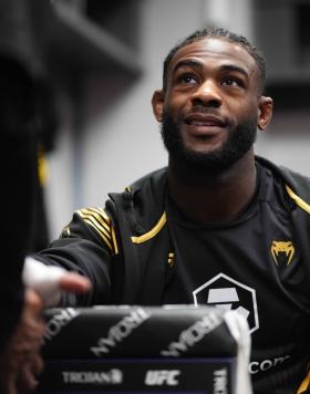 Aljamain Sterling has his hands wrapped prior to his fight during the UFC 273 event at VyStar Veterans Memorial Arena