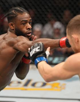 Aljamain Sterling punches Petr Yan of Russia in their UFC bantamweight championship fight during the UFC 273 event at VyStar Veterans Memorial Arena on April 09, 2022 in Jacksonville, Florida. (Photo by Jeff Bottari/Zuffa LLC)