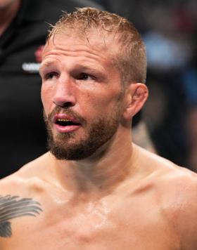 TJ Dillashaw returns to his corner after the first round of his UFC bantamweight championship fight against Aljamain Sterling during the UFC 280 event at Etihad Arena on October 22, 2022 in Abu Dhabi, United Arab Emirates. (Photo by Chris Unger/Zuffa LLC)