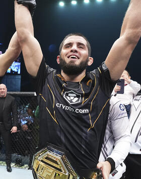 Islam Makhachev of Russia celebrates after his victory over Charles Oliveira of Brazil in their UFC lightweight championship fight during the UFC 280 event at Etihad Arena