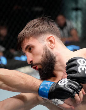 Nazim Sadykhov of Russia punches Evan Elder in a lightweight fight during the UFC Fight Night event at UFC APEX on February 18, 2023 in Las Vegas, Nevada. (Photo by Jeff Bottari/Zuffa LLC)