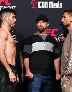 Opponents Matheus Nicolau of Brazil and Alex Perez face off during the UFC Fight Night weigh-in at UFC APEX on April 26, 2024 in Las Vegas, Nevada. (Photo by Chris Unger/Zuffa LLC)