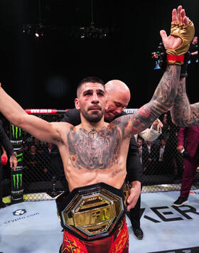 Ilia Topuria of Spain celebrates after a knockout victory against Max Holloway in the UFC featherweight championship fight during the UFC 308 event at Etihad Arena on October 26, 2024 in Abu Dhabi, United Arab Emirates. (Photo by Chris Unger/Zuffa LLC)