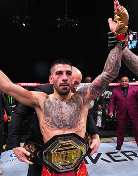 Ilia Topuria of Spain celebrates after a knockout victory against Max Holloway in the UFC featherweight championship fight during the UFC 308 event at Etihad Arena on October 26, 2024 in Abu Dhabi, United Arab Emirates. (Photo by Chris Unger/Zuffa LLC)