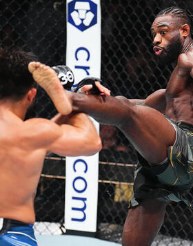 Aljamain Sterling kicks Henry Cejudo in the UFC bantamweight championship fight during the UFC 288 event at Prudential Center on May 06, 2023 in Newark, New Jersey. (Photo by Chris Unger/Zuffa LLC)